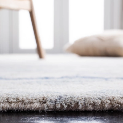 Abstract ABT465 Hand Tufted Area Rug - Safavieh 5 Abstract ABT465 Hand Tufted Area Rug - Safavieh - Image 3